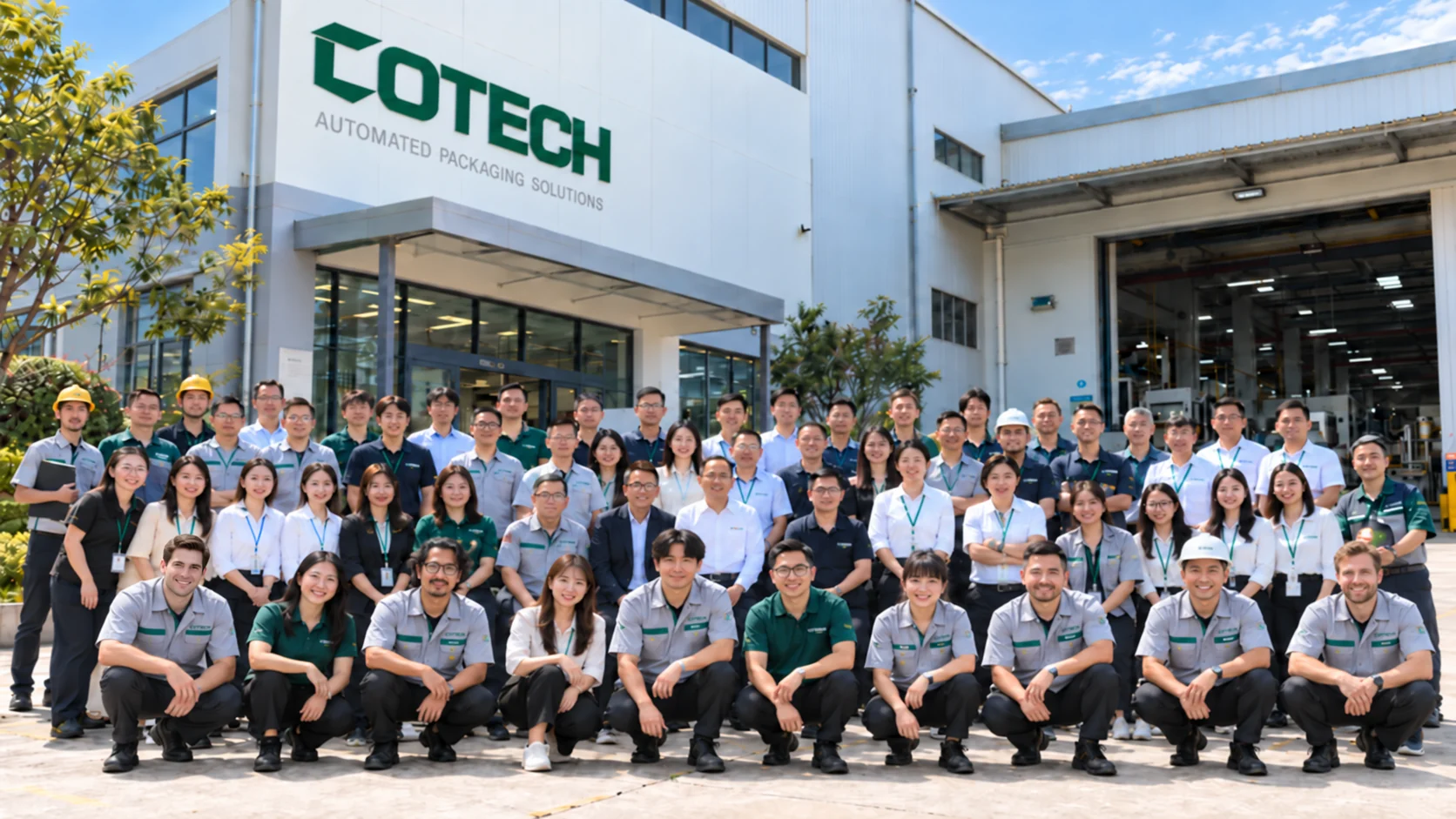 COTECH team standing in front of the Foshan factory